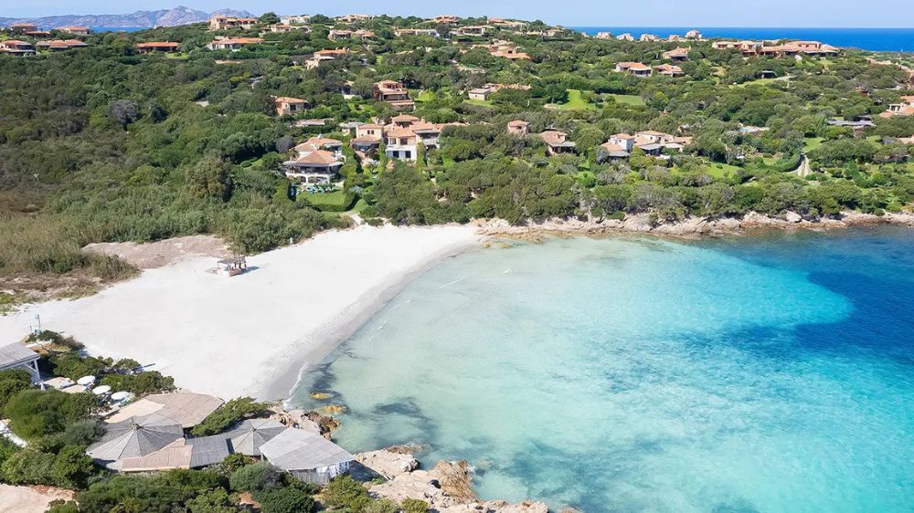 bild på ett tänt ljus och en buddha